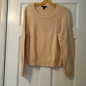 Peach color J. Crew sweater size XL.